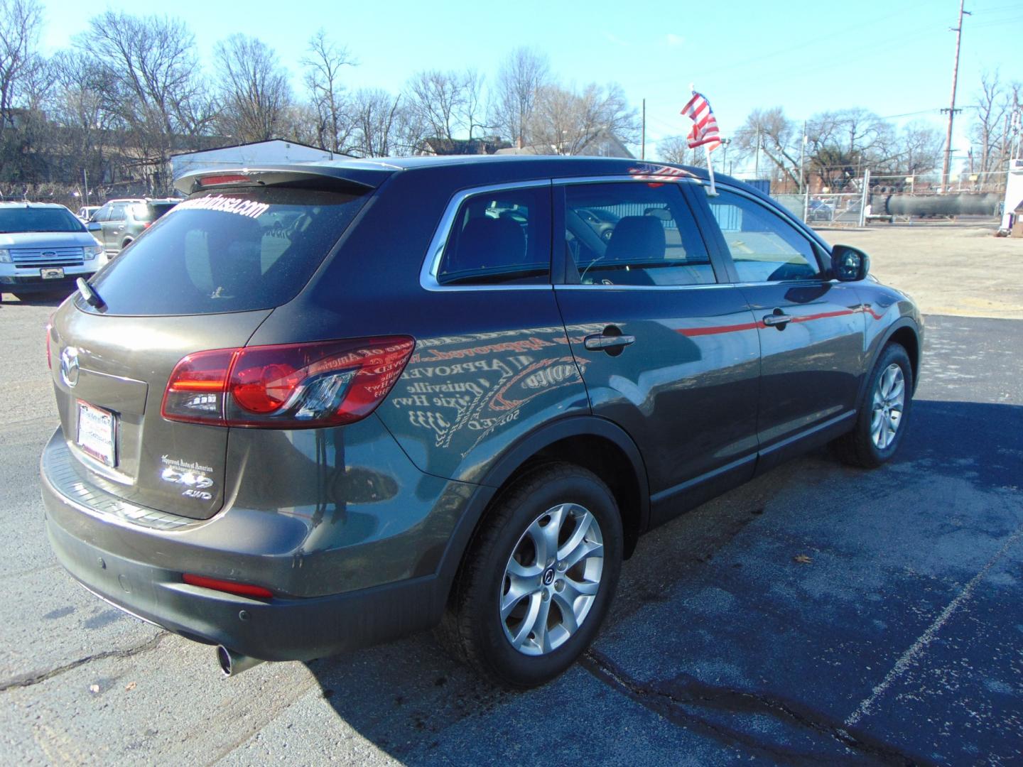 2015 Black MAZDA CX-9 (JM3TB3CA7F0) with an V6 3.7 Liter engine, Auto, 6-Spd Sportshift transmission, located at 2105 Dixie Hwy, Louisville, KY, 40210, (502) 772-3333, 38.220932, -85.795441 - Photo#16